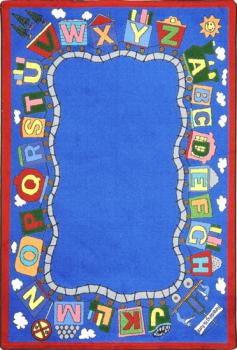 An ABC reading train classroom rug is displayed.