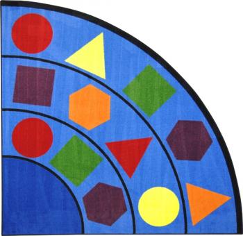 A corner shaped kids carpet rug with shapes for a classroom is displayed.