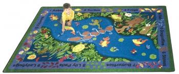A rectangular kids area rug is displayed for a classroom.