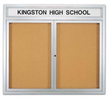 A bulletin board display is enclosed with tempered safety glass doors with tumbler pin locks. It also features a header bar overhead that is also behind glass.