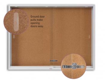 Features on the cork display board are ground rollers and a tumbling pin lock for security.