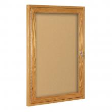 An oak framed enclosed cork board is shown with acrylic cover/