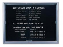 This glass message board is framed in aluminum with a tempered safety glass front.