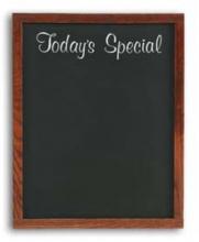 A small chalkboard menu that is framed in wood for changing specials daily. 