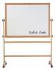 Displayed is a magnetic dry erase school room white board in a wooden frame. A full length accessory tray runs beneath the board.